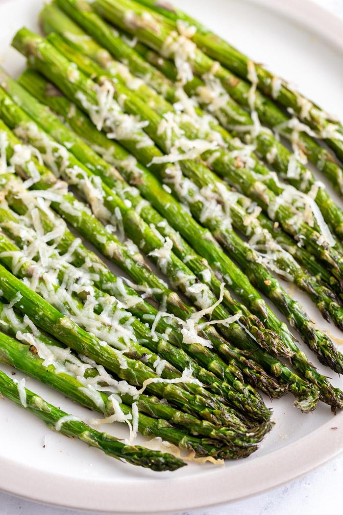 air fryer asparagus topped with parmesan cheese