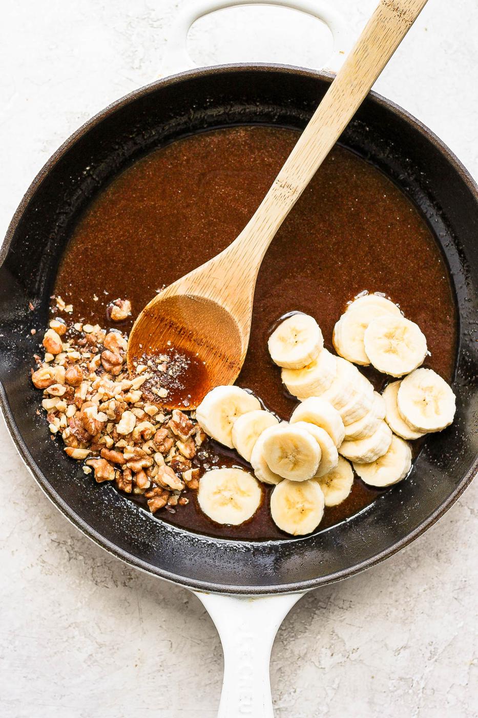 Making bananas foster in a skillet.