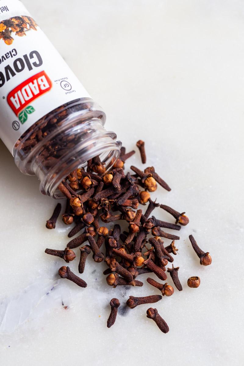 jar of spilled whole cloves