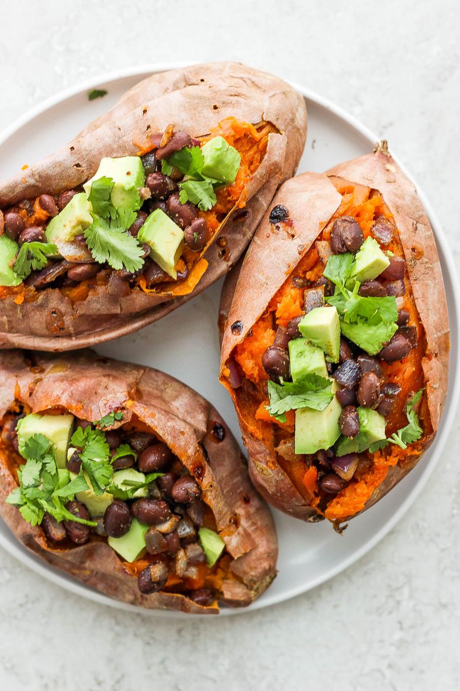 sweet potatoes stuffed with black beans, and avocado