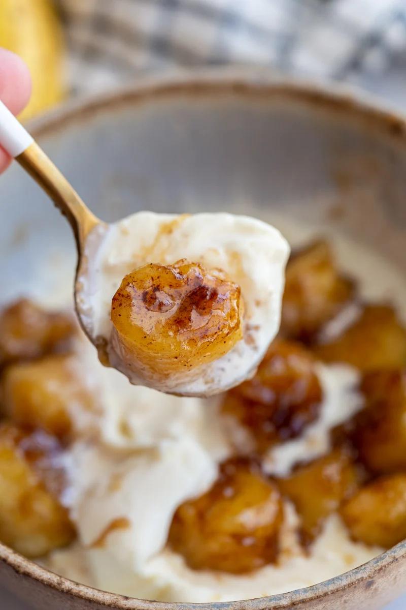 spoonful of ice cream and a caramelized banana slice