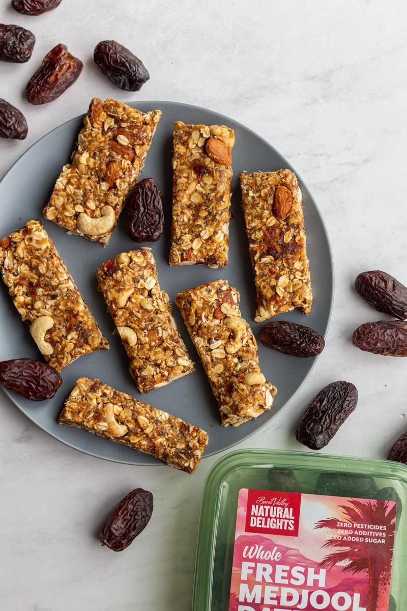 chewy granola bars on a blue plate