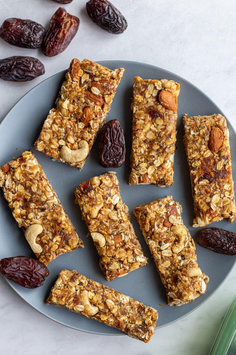chewy granola bars on a blue plate