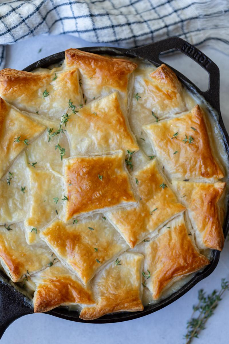chickpea puff pastry pot pie in a cast iron skillet
