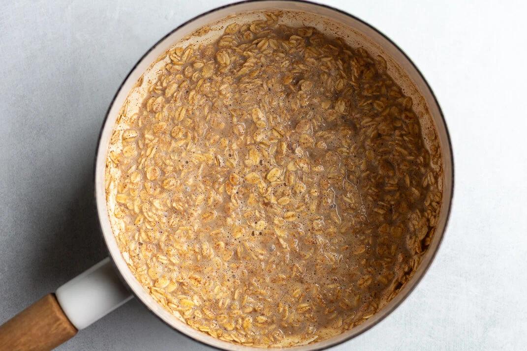 cinnamon oatmeal in a white pot