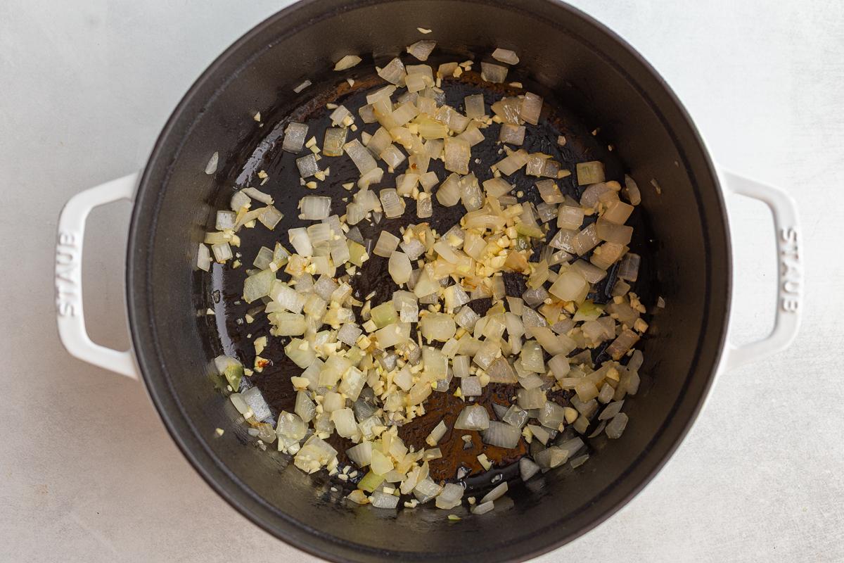 sautéed onions in a cast iron pot