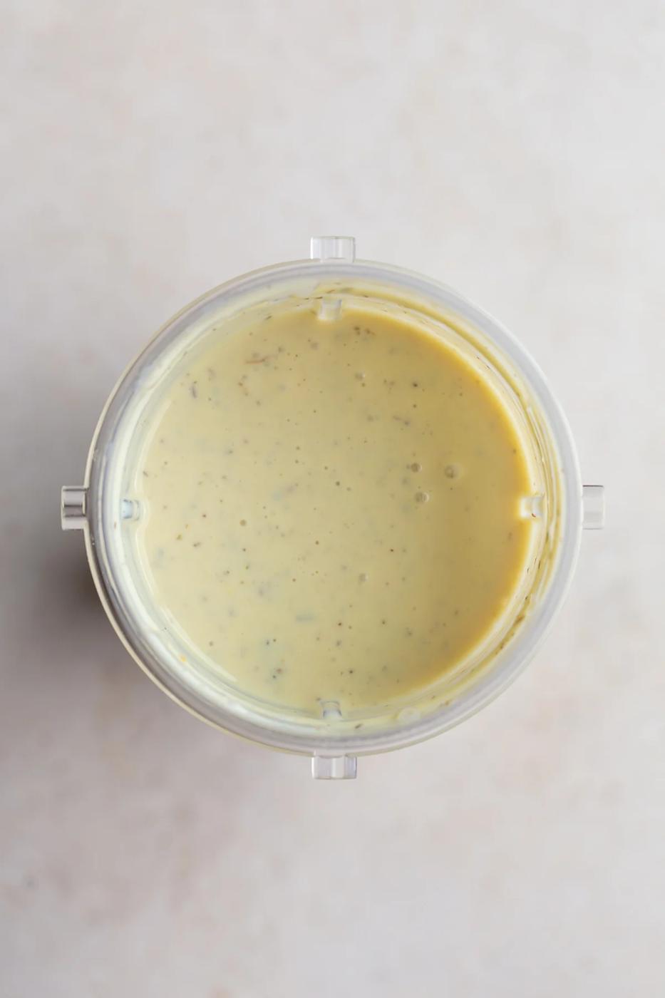 Tofu pasta sauce blended in a blender cup.
