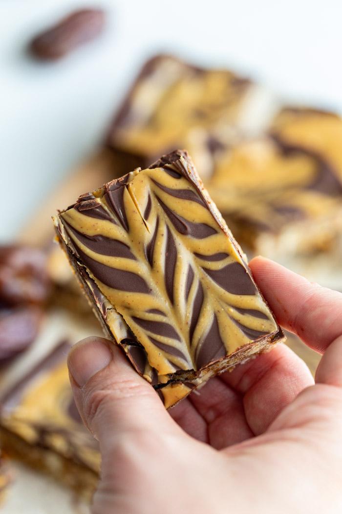 top down shot of a date nut bar that has chocolate on the top