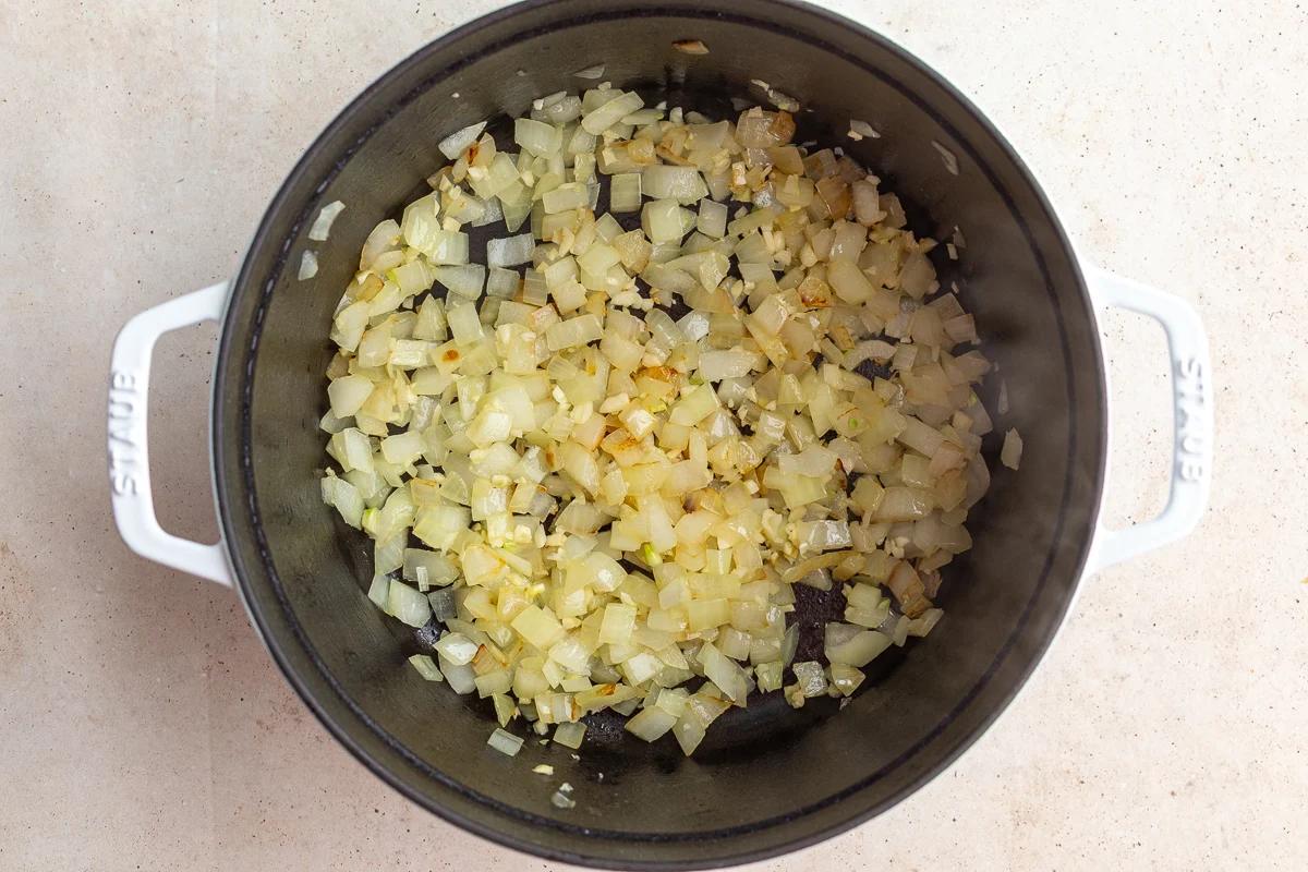 onion sauteed in a cast iron dutch oven