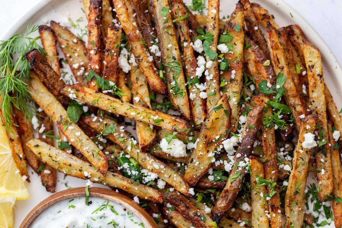 Greek Fries (Baked plus Feta + Herb Topping)