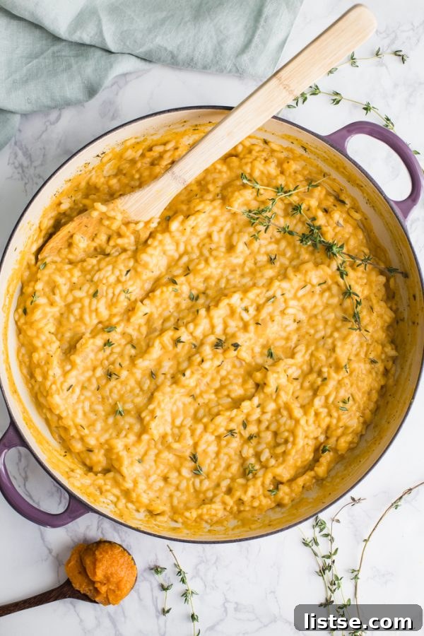 Close-up of creamy Pumpkin Goat Cheese Risotto with fresh herbs