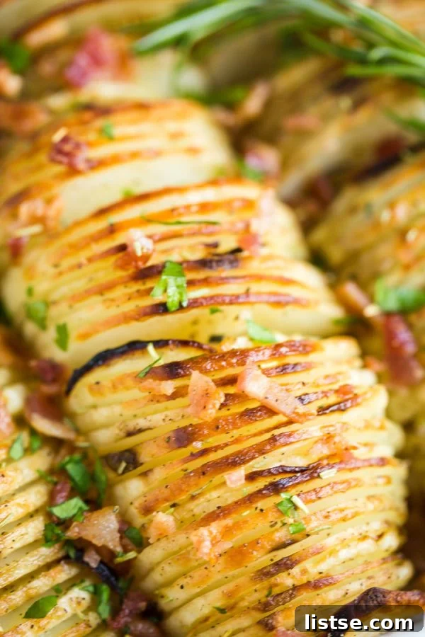 A delicious serving of Crispy Potato Bake with fresh herbs and bacon bits.