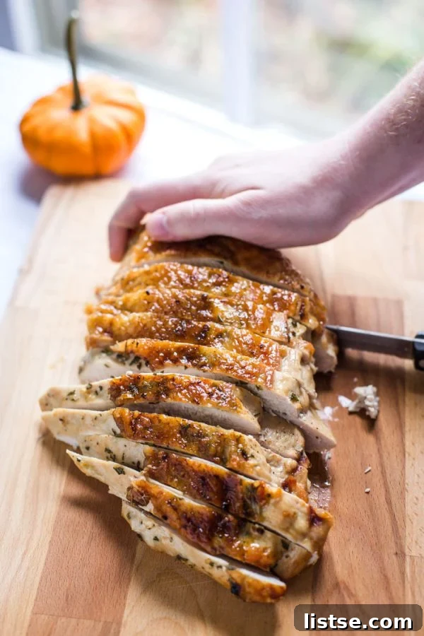 Juicy turkey breast cooked on a sheet pan for Thanksgiving.