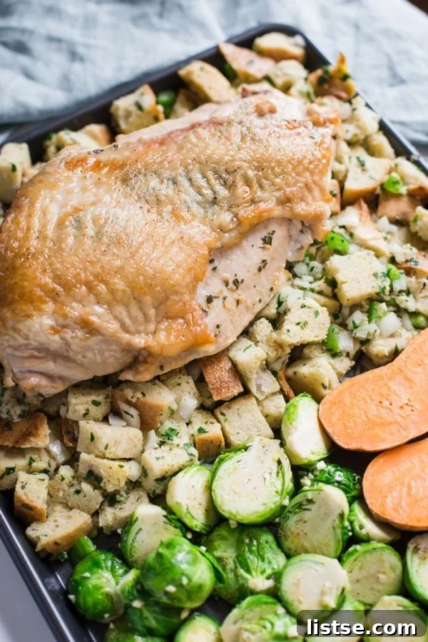 The assembled sheet pan Thanksgiving meal before its final bake.