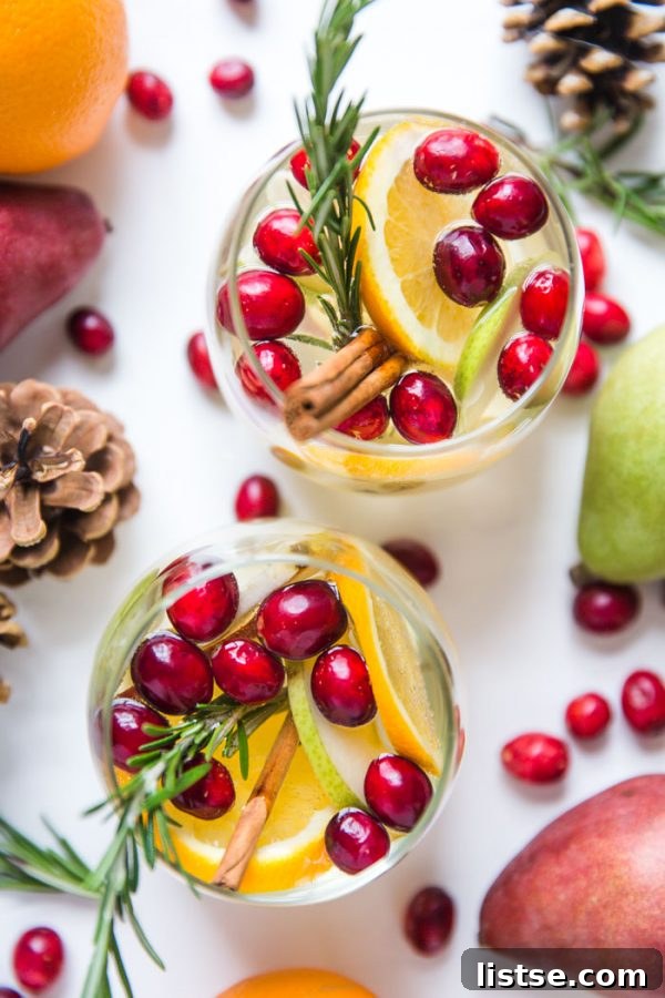 Easy Holiday Sangria - A delicious, festive, and make-ahead cocktail for your winter gatherings.