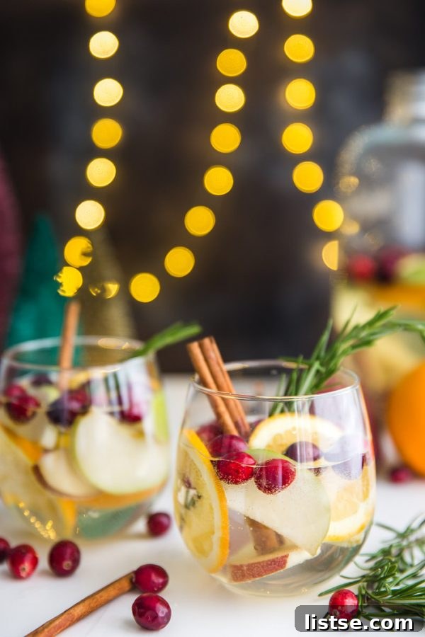 Infusing Holiday Sangria: Wine, fruits, and spices mingling for rich flavor.