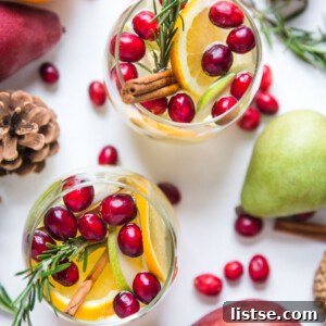 Garnished pitcher of Holiday Sangria.