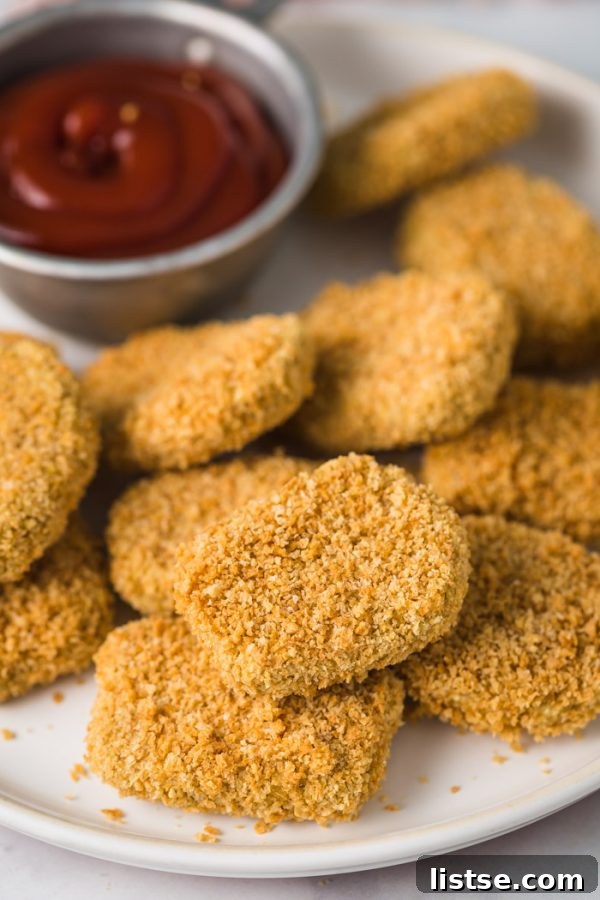 EASY Chickpea Nuggets- Vegan AND Gluten Free, these nuggets are the perfect meat-free alternative to your kids favorite meal! Easy to make and so delicious!
