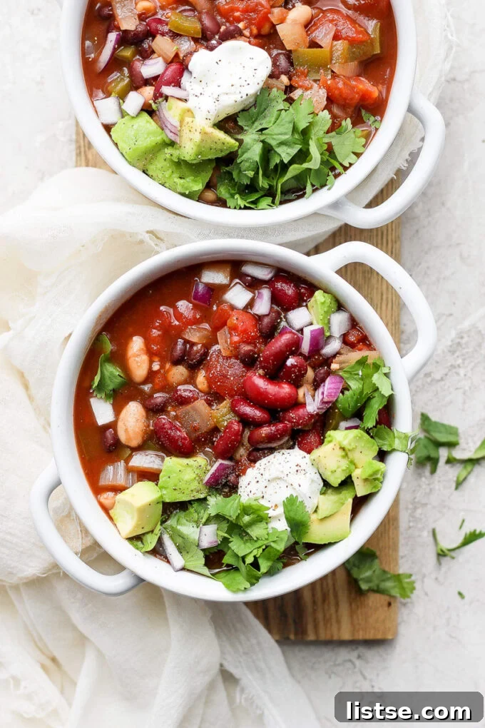 Hearty Slow Cooker Plant-Based Chili 3 two bowls of vegan crockpot chili