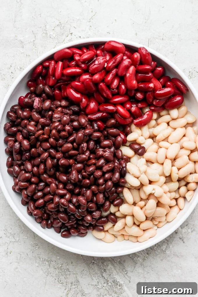 Hearty Slow Cooker Plant-Based Chili 5 3 types of beans in a white bowl
