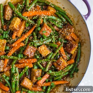 Tempeh stir fry, a quick and delicious vegan dinner with sesame ginger sauce.