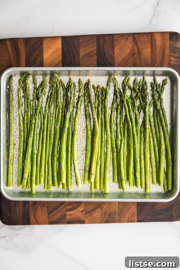Oven Baked Asparagus spears seasoned with garlic, salt, and pepper