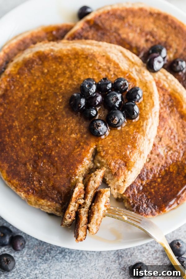Close-up of fluffy vegan protein powder pancakes.
