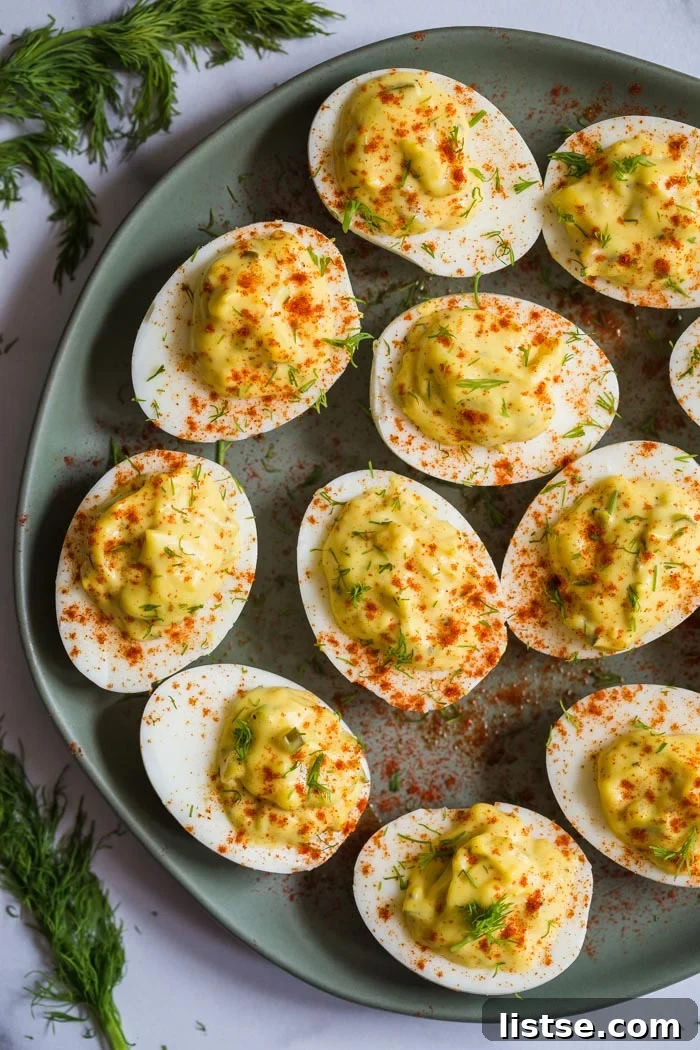 Dixie's Deviled Delights 2 deviled egg recipe with relish and paprika on top