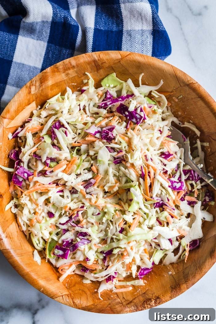 Effortless Creamy Vegan Coleslaw 2 Creamy and tangy vinegar-based vegan coleslaw, perfect for summer gatherings.