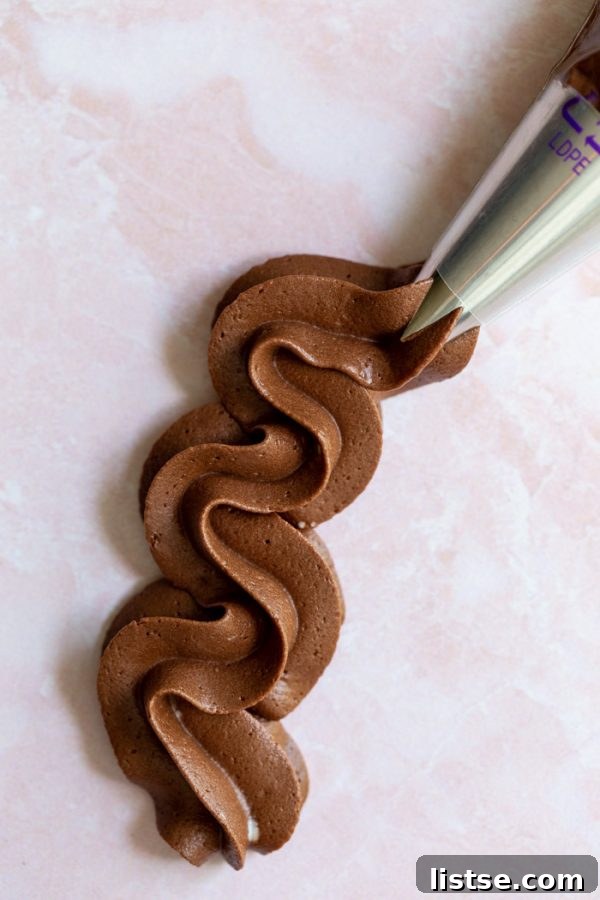 Silky Vegan Chocolate Dream Frosting 3 Easy homemade vegan buttercream frosting in a bowl