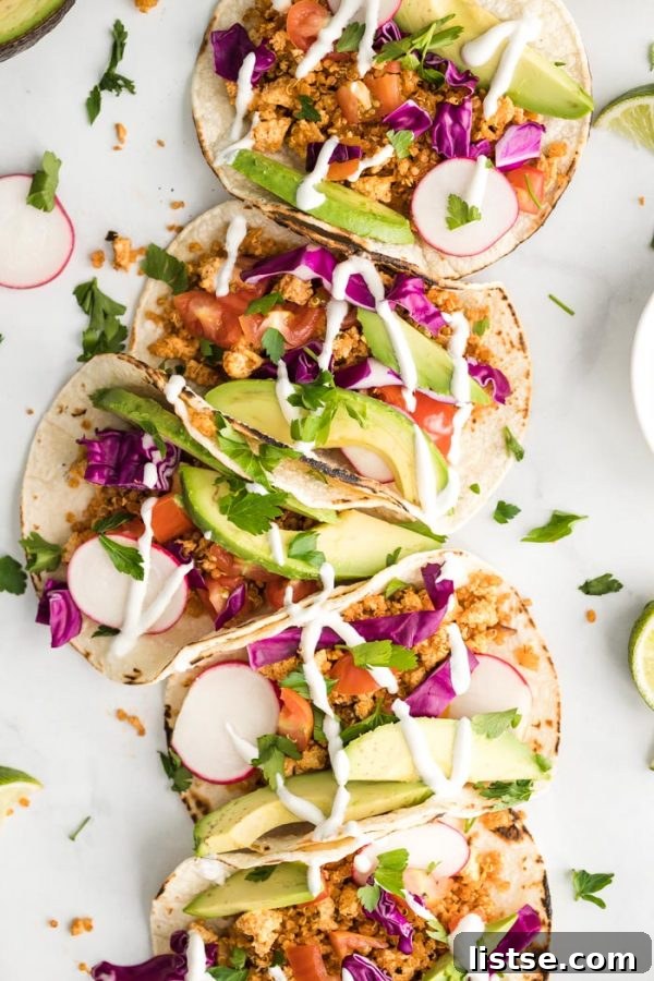 Delicious vegan tofu and quinoa tacos with fresh toppings