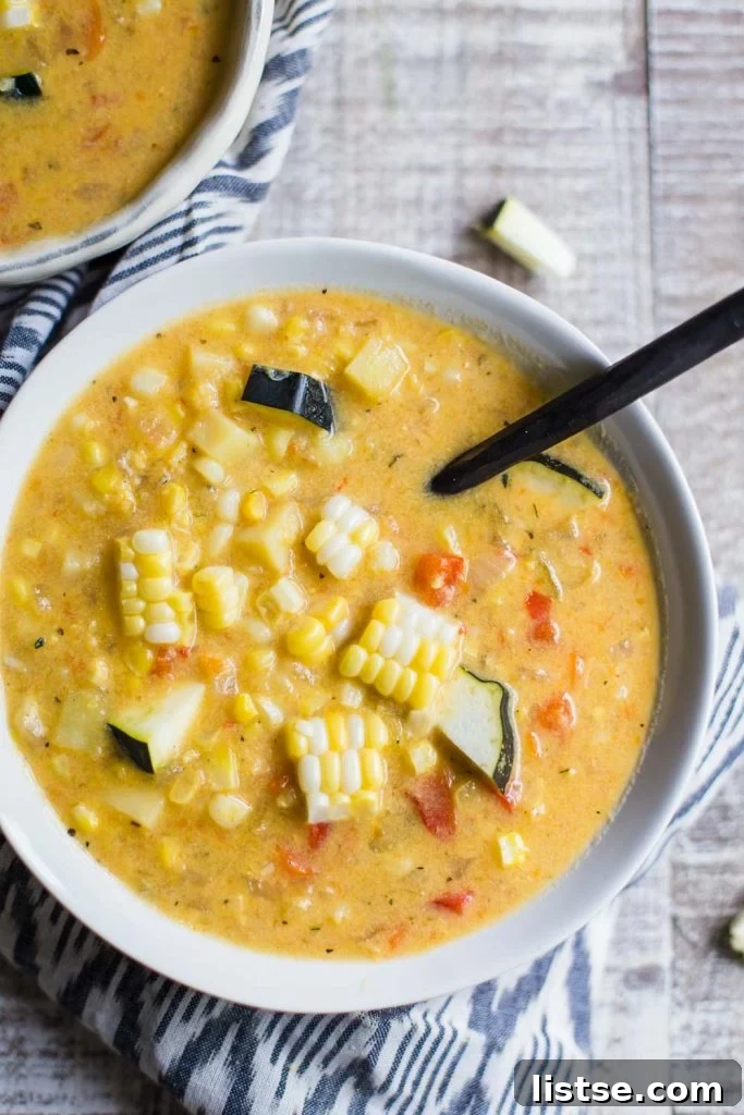 Hearty and creamy vegan corn chowder in a bowl
