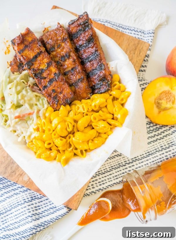 Delectable tempeh ribs slathered in peach BBQ sauce.