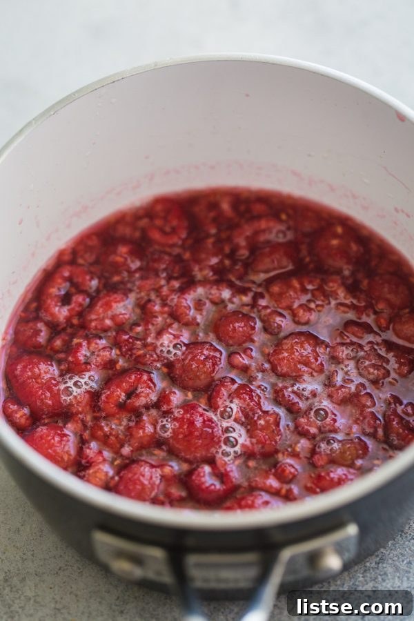 Homemade Simple Syrup 6 Raspberry Simple Syrup being prepared with fresh berries