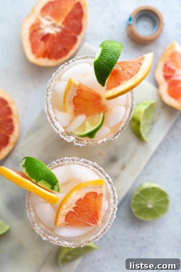 Grapefruit Sunset Margarita 3 Close-up of fresh grapefruits and limes, ready to be juiced for a refreshing margarita.