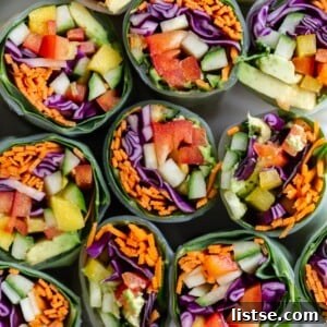 Freshly rolled summer roll with peanut sauce