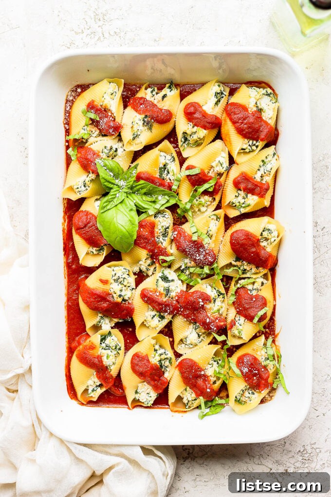 Creamy Vegan Stuffed Shells 8 Close-up of jumbo pasta shells baked with a creamy vegan ricotta filling, ready to serve.