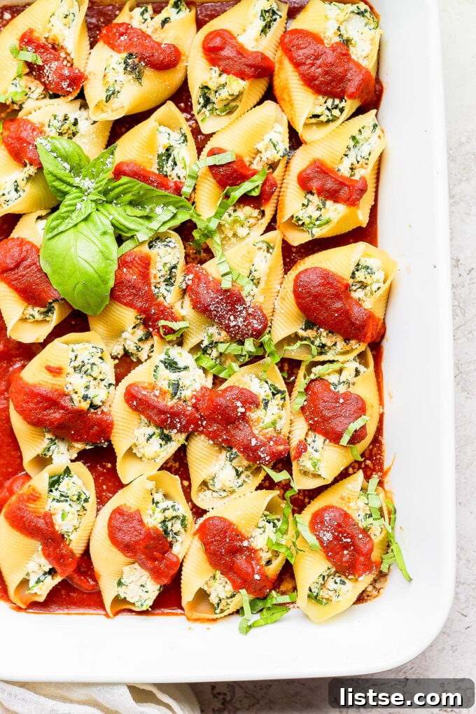 Creamy Vegan Stuffed Shells 10 Close-up of jumbo pasta shells stuffed with creamy vegan ricotta and baked in rich marinara sauce.
