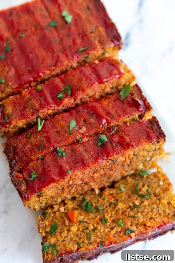 Delicious and Hearty Vegan Meatloaf, perfect for holiday meals or a comforting family dinner. Made with Pure Farmland's plant-based protein, this recipe is easy, satisfying, and full of flavor. #vegan #plantbased #veganrecipe #meatloaf #holidayfood
