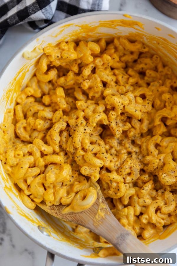 Creamy vegan macaroni and cheese in a pot, ready to serve.