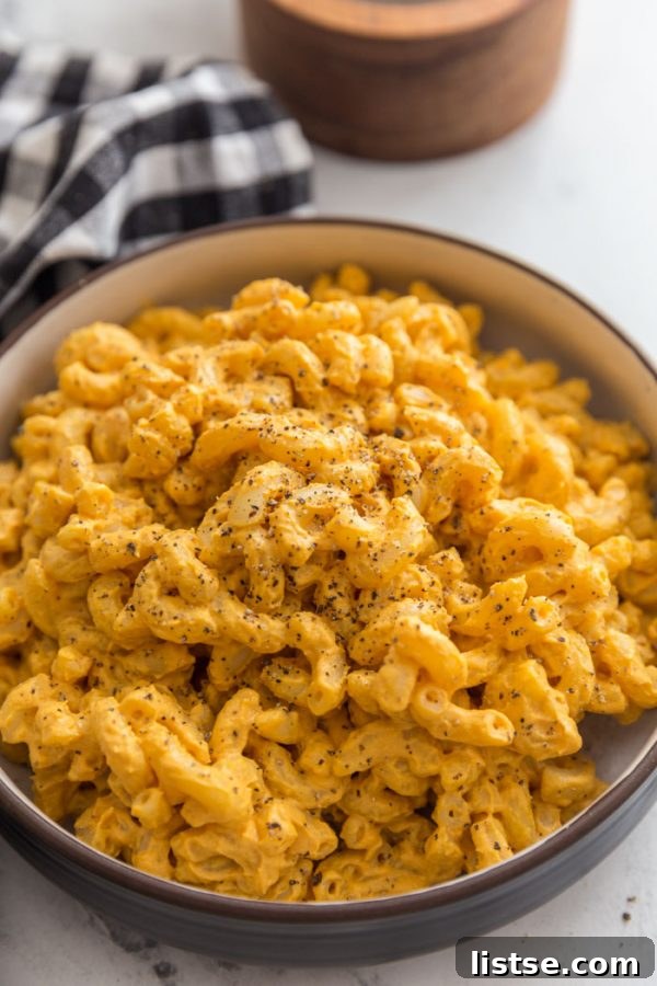 A large bowl filled with the best vegan mac and cheese, perfectly mixed and ready to enjoy.
