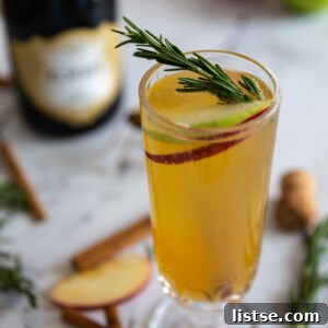 A festive Apple Cider Mimosa cocktail