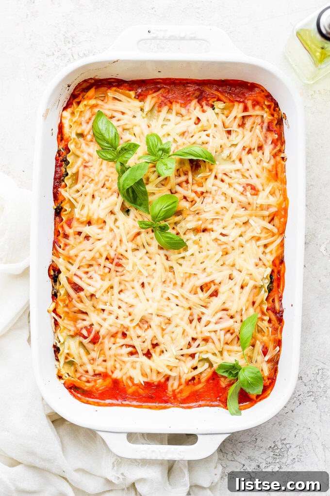 Ultimate Vegan Lasagna 7 Baked lasagna topped with fresh basil.