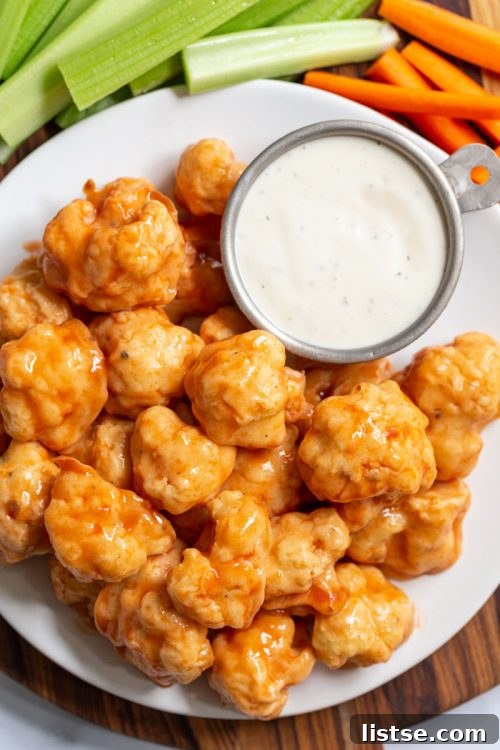 Crispy and spicy vegan buffalo cauliflower wings, a healthy and delicious appetizer for super bowl and game day parties