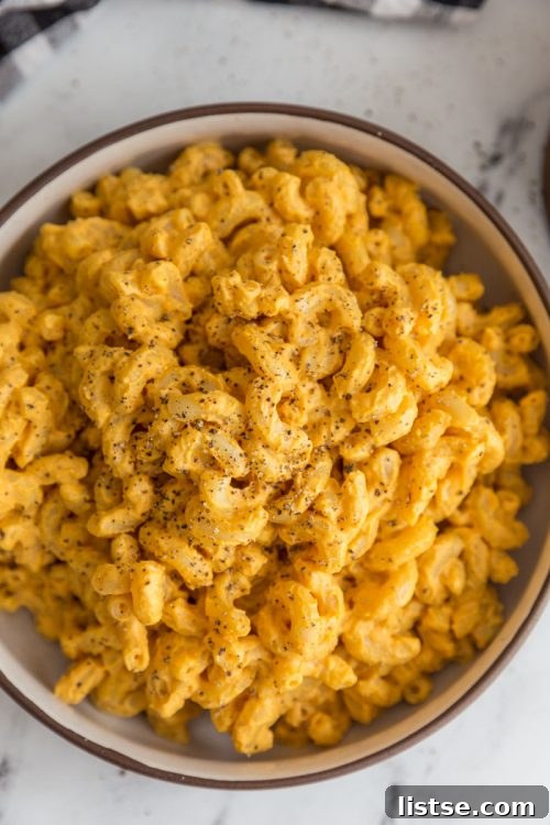 Creamy vegan mac and cheese topped with black pepper