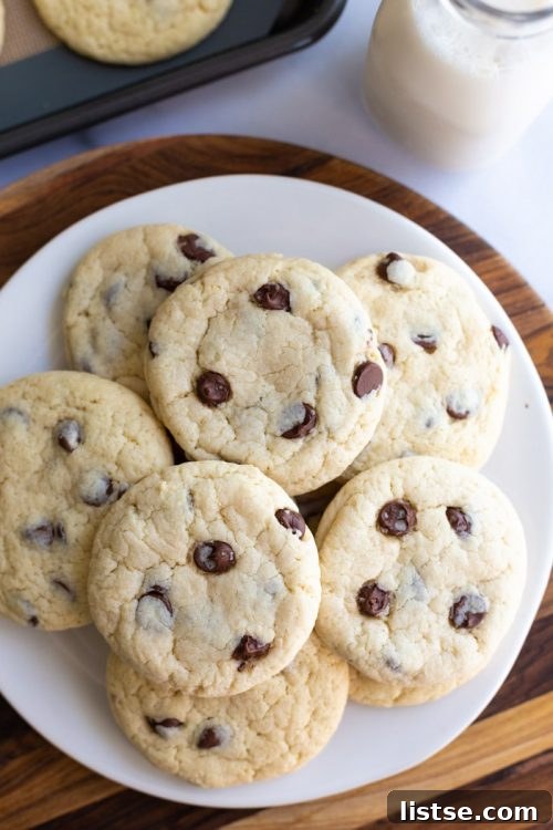 Plate full of perfectly baked vegan chocolate chip cookies