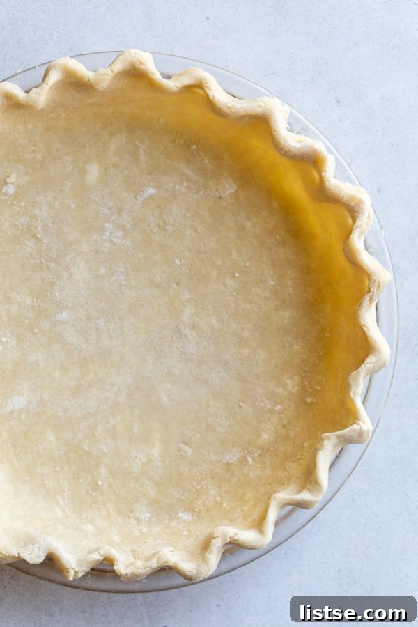 Unbaked vegan pie crust in a pie dish