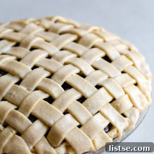 side shot of a lattice pie unbaked