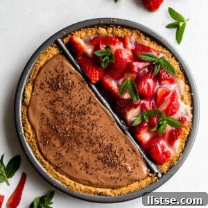 Sweet Divide Pie: Strawberry & Chocolate 7 A vibrant split decision pie, one half chocolate, one half fresh strawberry, garnished with mint.