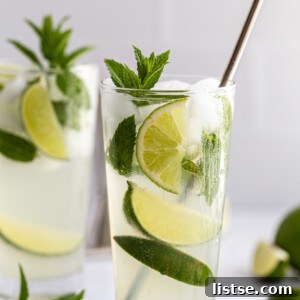 A vibrant Ginger Beer Mojito with garnish